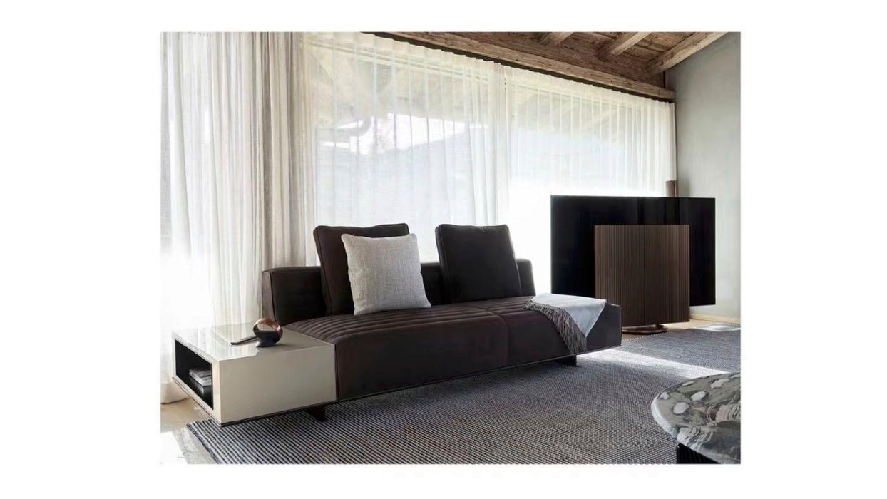 Modern living room with a gray sofa, coffee table