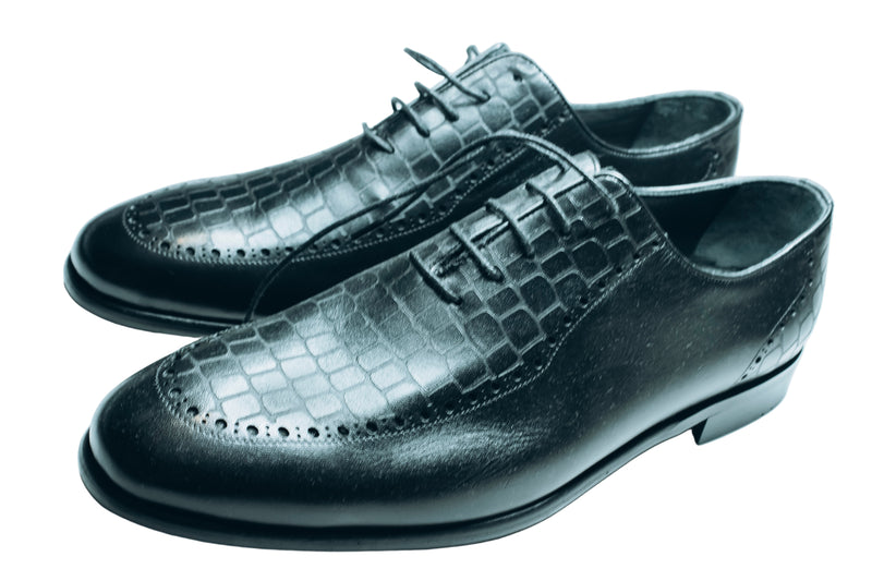 Ferromente| black leather shoes with a crocodile pattern on the upper|featuring lace-up closure and a rubber sole.