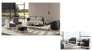 Modern living room furniture set with sofa, chairs, and coffee table in a stylish interior setting.