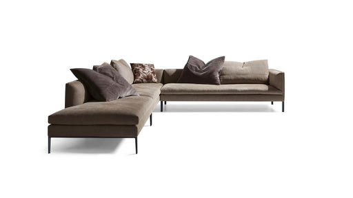 Brown sectional sofa with cushions on a white background